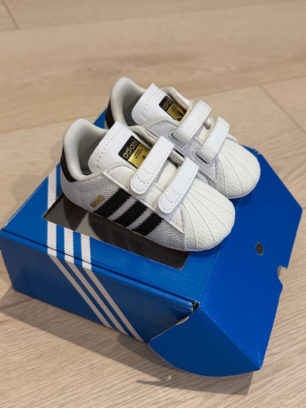 adidas Kids White Sneakers with Black Stripes & Gold Logo